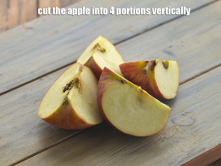 Step 12 – <p>Cut the apple into 4 portions vertically using a sharp knife.</p>