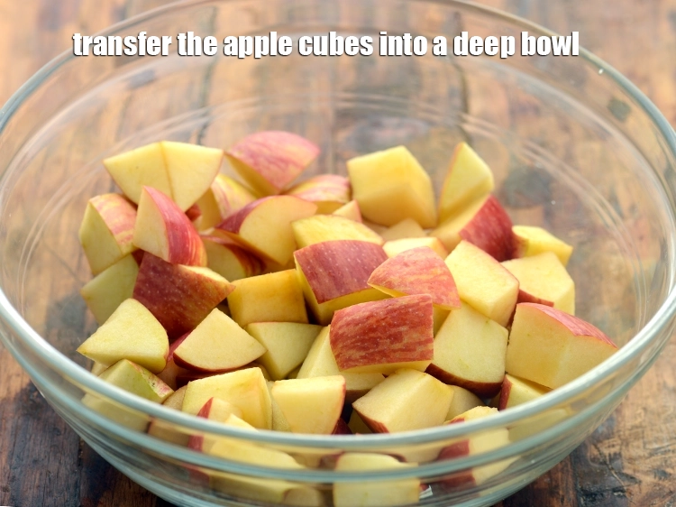 Step 15 – <p>Transfer the <span style="background-color:rgb(255,255,255);color:rgb(0,0,0);">3 cups </span><a href="https://www.tarladalal.com/glossary-apple-seb-54i#ing_2980"><u>apple cubes</u></a> into a deep bowl and keep aside.</p>