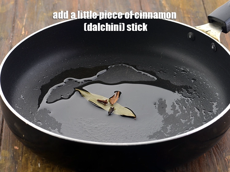 Step 12 – <p>Also add a little piece of <span style="background-color:rgb(255,255,255);color:rgb(0,0,0);">25 mm </span><a href="https://www.tarladalal.com/glossary-cinnamon-dalchini-346i"><u>cinnamon (dalchini) </u></a><span style="background-color:rgb(255,255,255);color:rgb(0,0,0);">stick</span> to …