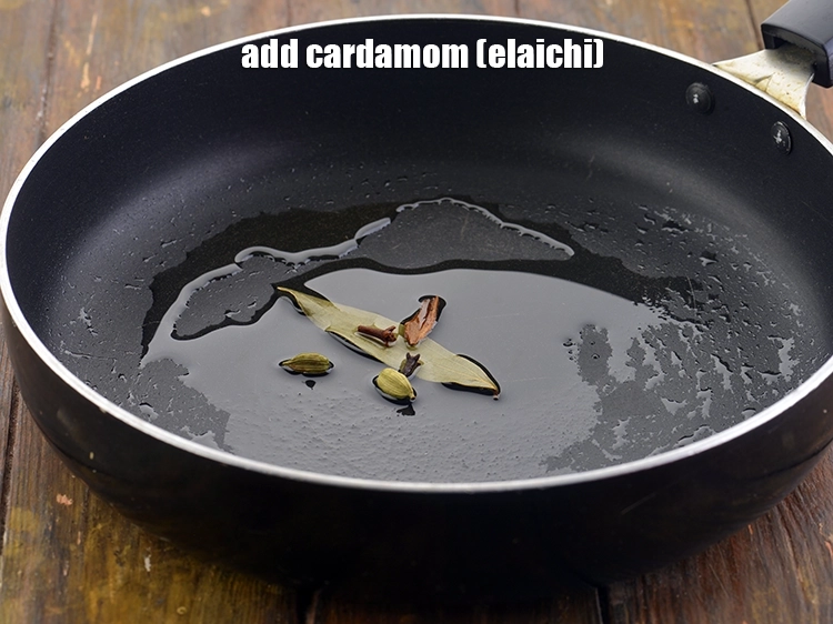 Step 13 – <p>Then add the whole <span style="background-color:rgb(255,255,255);color:rgb(0,0,0);">2 </span><a href="https://www.tarladalal.com/glossary-cardamom-elaichi-262i"><u>cardamom (elaichi)</u></a> to give a unique fragrance and …