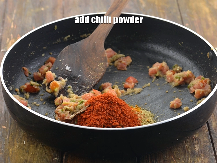 Step 25 – <p>Add the <span style="background-color:rgb(255,255,255);color:rgb(0,0,0);">2 tsp </span><a href="https://www.tarladalal.com/glossary-chilli-powder-red-chilli-powder-339i"><u>chilli powder</u></a><u>.</u></p>