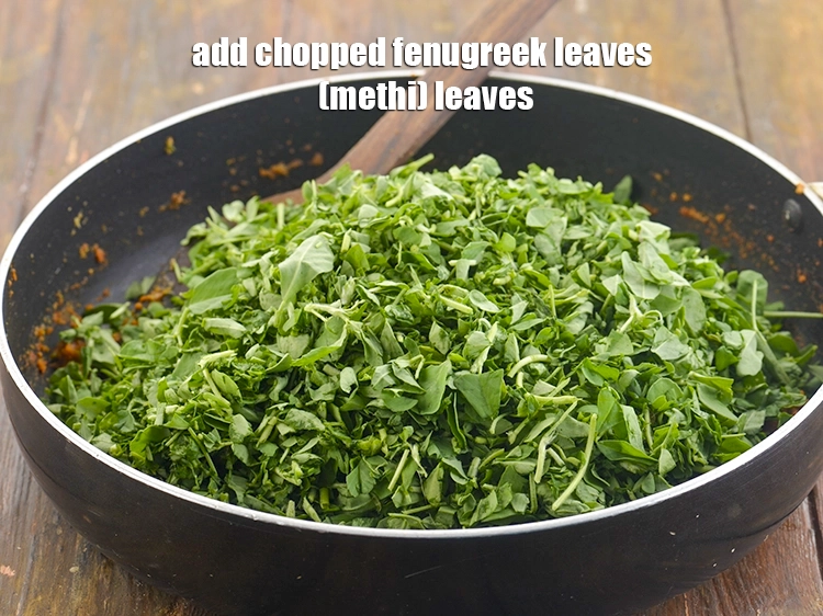 Step 28 – <p>Now add the <span style="background-color:rgb(255,255,255);color:rgb(0,0,0);">3 cups </span><a href="https://www.tarladalal.com/glossary-fenugreek-leaves-methi-methi-leaves-methi-ke-patte-methi-ki-bhaji-373i#ing_2382"><u>chopped fenugreek leaves (methi) </u></a><span style="background-color:rgb(255,255,255);color:rgb(0,0,0);">leaves</span>. Methi (fenugreek) …