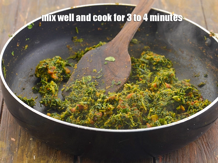 Step 29 – <p>Mix well and cook for 3 to 4 minutes, while stirring occasionally. The methi has …