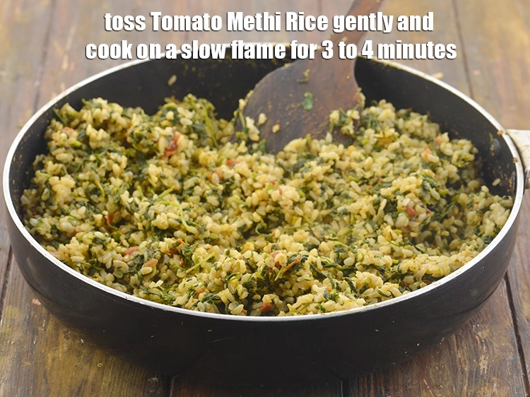 Step 32 – <p>Toss&nbsp;<strong>Tomato Methi Rice</strong>&nbsp;gently and cook on a slow flame for 3 to 4 minutes till …