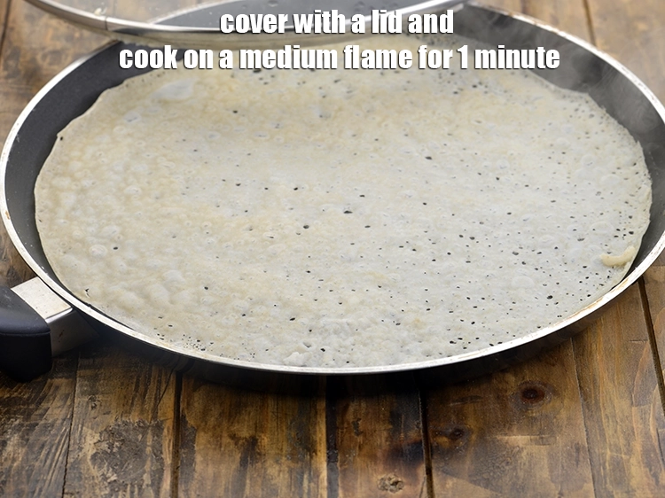 Step 11 – <p><span style="background-color:rgb(255,255,255);color:rgb(0,0,0);">Cover with a lid and cook on a medium flame for 1 minute.</span></p>