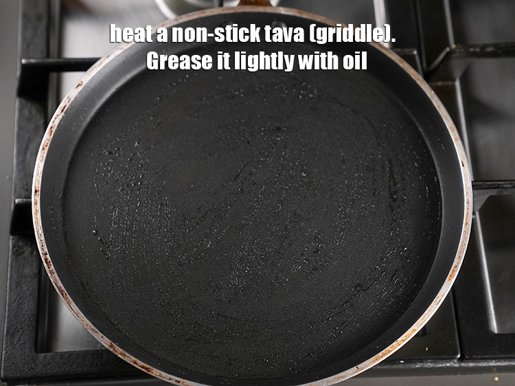 Step 6 – <p>To make <strong>Brown Rice Neer Dosa, Without Fermentation</strong>, heat a non-stick tava (griddle). Grease it …
