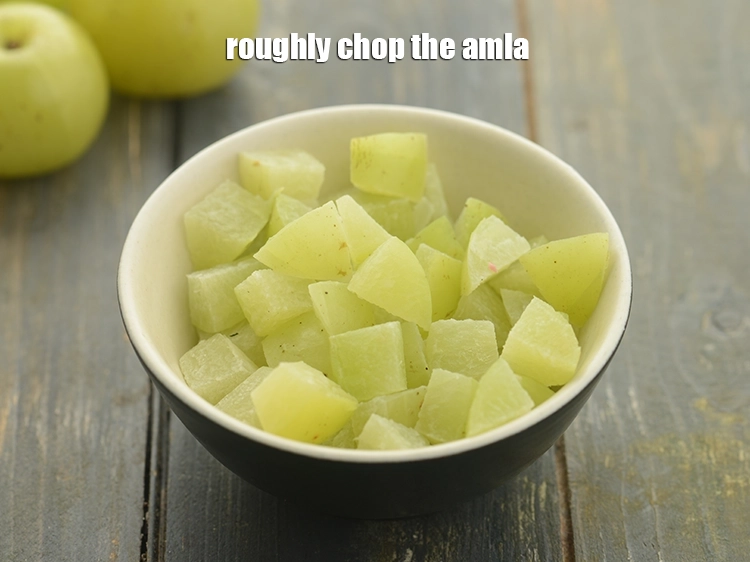 Step 8 – <html><head><meta charset="UTF-8"></head><body><p><strong>Roughly chop</strong> the amla for&nbsp;<strong>healthy</strong>&nbsp;<strong>amla honey shot for weight loss</strong>. You will need around …
