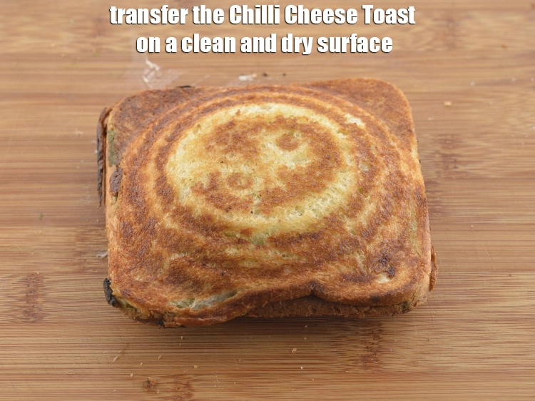 Step 18 – <p>Transfer the <strong>Chilli Cheese&nbsp;Toast</strong> on a clean and dry surface.</p>