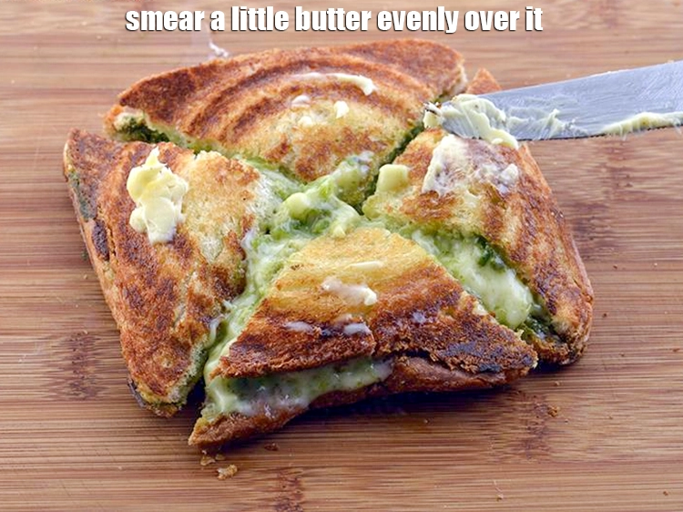 Step 21 – <p>Smear a little <a href="https://www.tarladalal.com/glossary-butter-makhan-233i"><u>butter</u></a> ( ½ tsp approx.) evenly over it.</p>