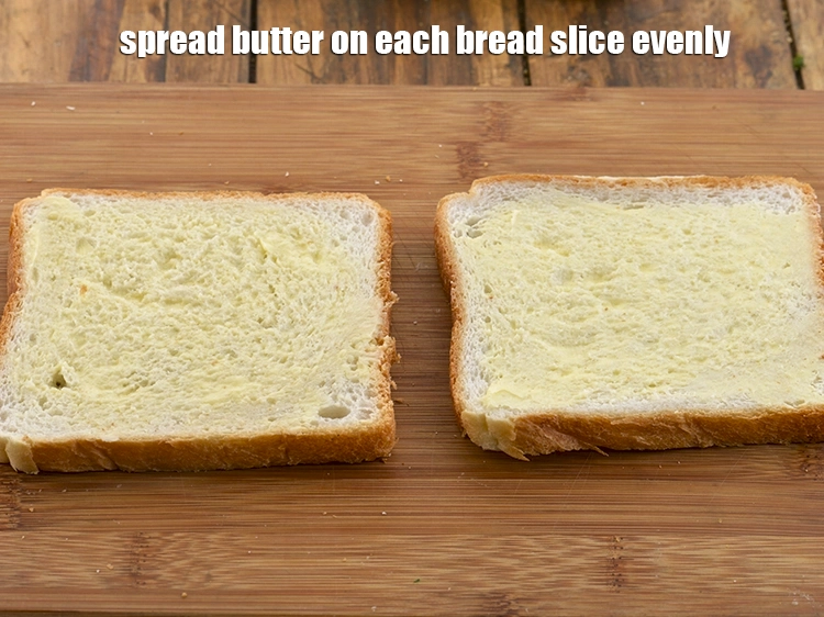 Step 7 – <p>Spread about ½ tsp of <a href="https://www.tarladalal.com/glossary-butter-makhan-233i"><u>butter</u></a> on each <strong>bread slice</strong> evenly. Keep the buttered …