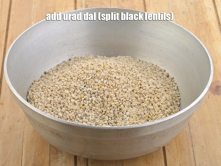 Step 12 – <p>Add the <span style="background-color:rgb(255,255,255);color:rgb(0,0,0);">1/2 cup </span><a href="https://www.tarladalal.com/glossary-urad-dal-split-black-lentil-941i"><u>urad dal (split black lentils)</u></a><u>.</u></p>