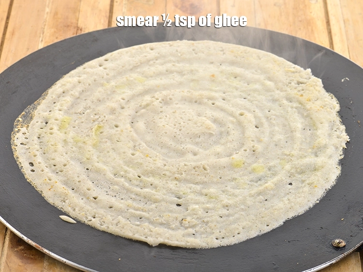 Step 34 – <p><span style="background-color:rgb(255,255,255);color:rgb(0,0,0);">Smear ½ tsp of </span><a href="https://www.tarladalal.com/glossary-ghee-245i"><u>ghee</u></a><span style="background-color:rgb(255,255,255);color:rgb(0,0,0);">.</span></p>