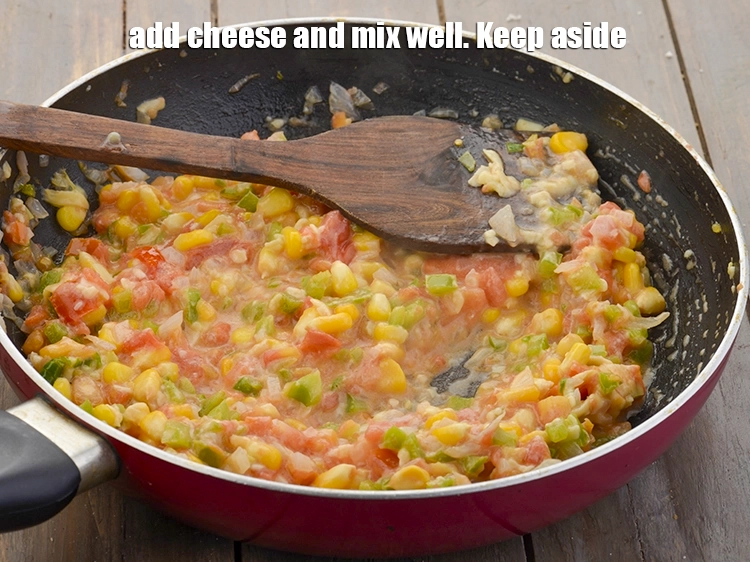 Step 10 – <p><span style="background-color:rgb(255,255,255);color:rgb(0,0,0);">Add the 1/2 cup </span><a href="https://www.tarladalal.com/glossary-processed-cheese-315i#ing_3090"><u>grated processed cheese</u></a><span style="background-color:rgb(255,255,255);color:rgb(0,0,0);"> and mix well. Keep aside.</span></p>