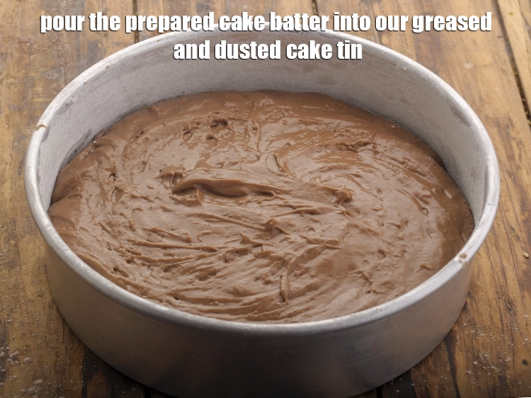Step 23 – <p>Pour the <strong>prepared cake batter</strong> into our greased and dusted cake tin. Lightly tap it …