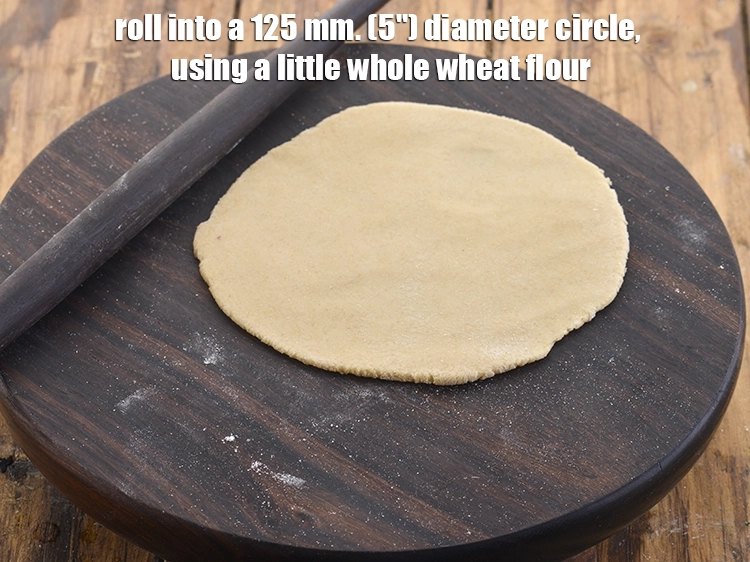 Step 39 – <p>For a circle paratha, simply roll into a 125 mm. (5") diameter circle, using a …