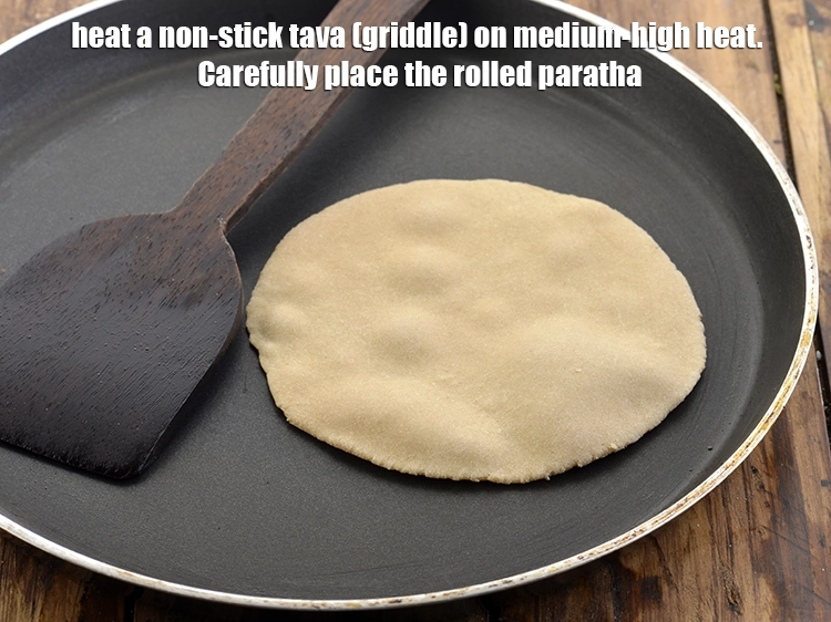 Step 40 – <p><span style="background-color:rgb(255,255,255);color:rgb(0,0,0);">Heat a non-stick tava (griddle) on medium-high heat. Carefully place the rolled paratha on …