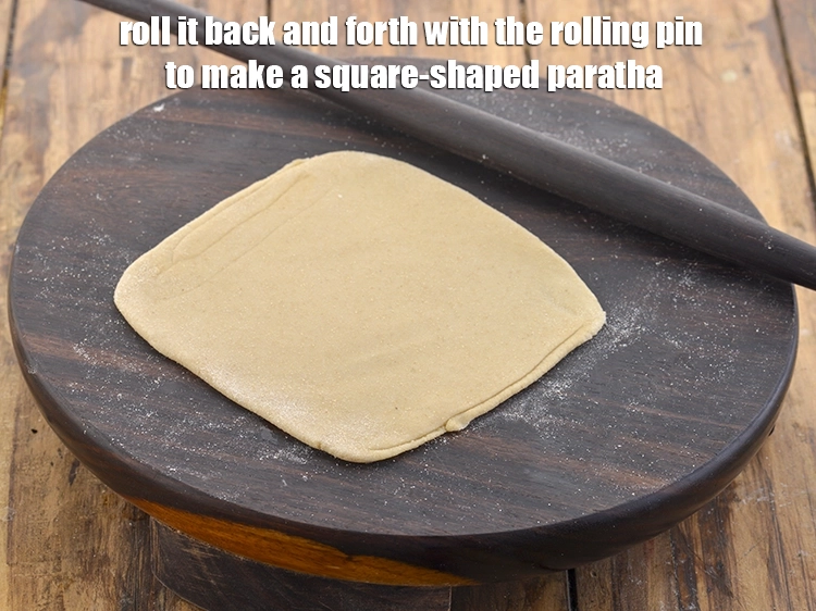 Step 34 – <p>Dip the dough in the dry flour and roll it back and forth with the …