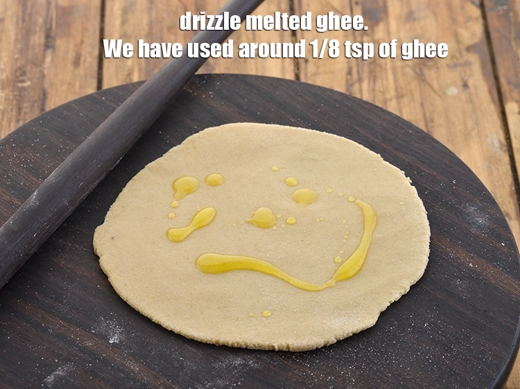 Step 25 – <p>Drizzle melted <a href="https://www.tarladalal.com/glossary-ghee-245i"><u>ghee</u></a>. We have used around 1/8 tsp of ghee.</p>