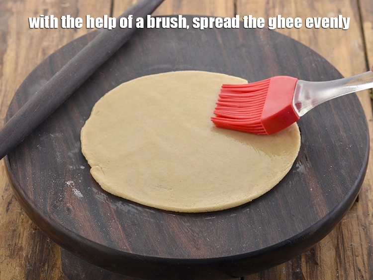 Step 26 – <p>With the help of a brush, <strong>spread</strong> the ghee evenly.</p>