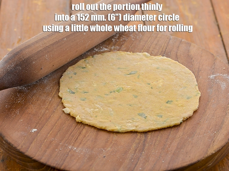 Step 21 – <p>Roll out the portion thinly into a 152 mm. (6") diameter circle using a little …