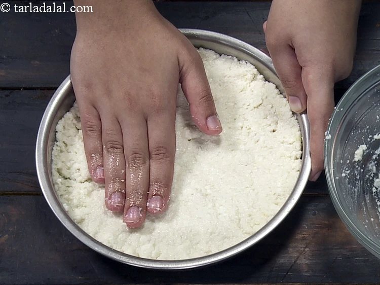 Step 15 – <p>Spread the white mixture in an even layer in a 150 mm. (6”) diameter thali.</p>