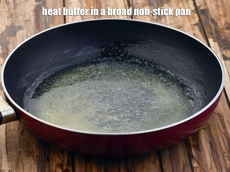Step 5 – <p><span style="background-color:rgb(255,255,255);color:rgb(0,0,0);">Heat the 2 tbsp </span><a href="https://www.tarladalal.com/glossary-butter-makhan-233i"><u>butter</u></a><span style="background-color:rgb(255,255,255);color:rgb(0,0,0);"> in a broad non-stick pan.</span></p>