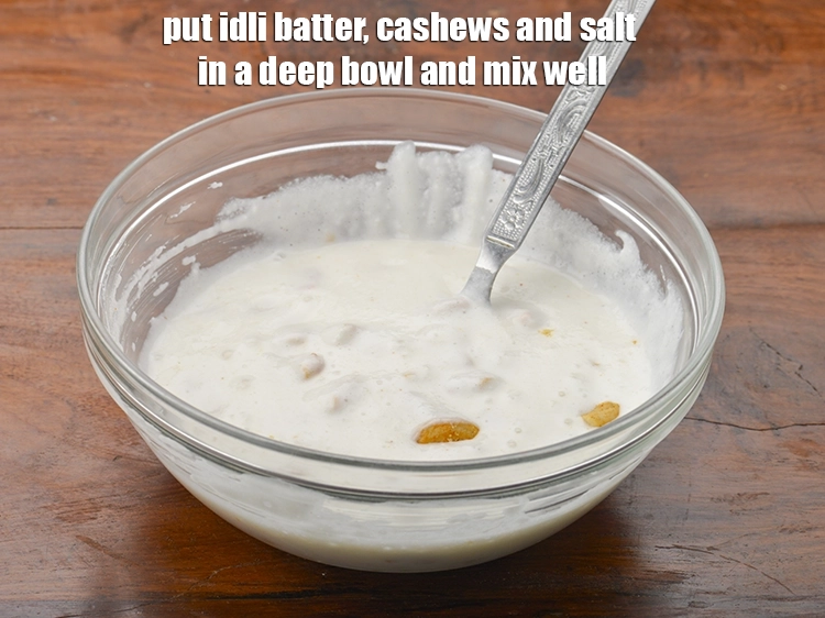 Step 2 – <p>put <span style="background-color:rgb(255,255,255);color:rgb(0,0,0);">1 cup </span><a href="https://www.tarladalal.com/glossary-idli-batter-1874i"><u>idli batter</u></a><span style="background-color:rgb(255,255,255);color:rgb(0,0,0);">, 1/2 cup </span><a href="https://www.tarladalal.com/glossary-masala-cashew-nuts-masala-kaju-2503i#ing_3295"><u>chopped masala cashew nut</u></a><span …