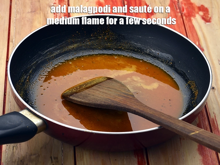 Step 8 – <p><span style="background-color:rgb(255,255,255);color:rgb(0,0,0);">Add the </span><span style="background-color:rgb(255,255,255);color:rgb(13,13,13);">1 tbsp </span><a href="https://www.tarladalal.com/milagai-podi-malgapodi-powder-south-indian-gun-powder-recipe-41383r"><u>milagai podi</u></a><span style="background-color:rgb(255,255,255);color:rgb(0,0,0);"> and <strong>sauté </strong>on a medium …