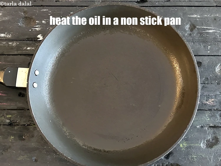 Step 7 – <html><head></head><body><p>Heat&nbsp;1/2 tbsp&nbsp;<a href="glossary-oil-671i">oil</a>&nbsp;in a non stick pan.</p></body></html>