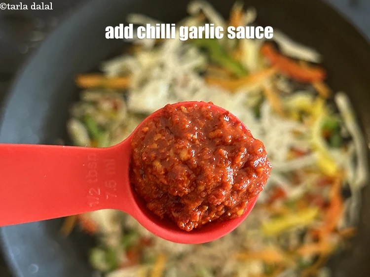 Step 17 – <html><head></head><body><p>Add&nbsp;1/2 tbsp&nbsp;<a href="glossary-chilli-garlic-sauce-1005i">chilli-garlic sauce</a>.</p></body></html>
