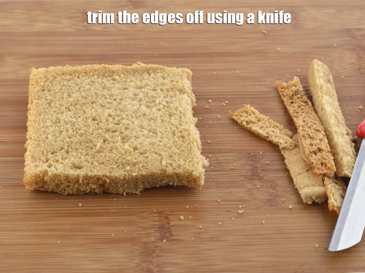 Step 24 – <p>Place a <a href="https://www.tarladalal.com/glossary-whole-wheat-bread-gehun-ka-bread-855i"><u>whole wheat bread </u></a><span style="background-color:rgb(255,255,255);color:rgb(0,0,0);">slices</span> on a flat dry rolling board and …