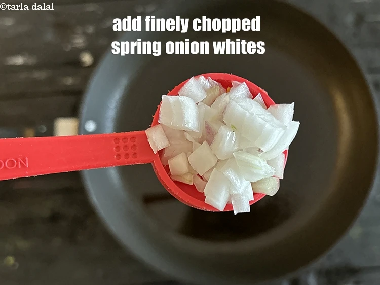 Step 8 – <html><head></head><body><p>Add&nbsp;2 tbsp&nbsp;finely&nbsp;<a href="glossary-chopped-spring-onion-whites-815i">chopped spring onions whites</a>.</p></body></html>