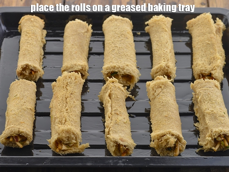 Step 31 – <html><head><meta charset="UTF-8"></head><body><p><span style="background-color:rgb(255,255,255);color:rgb(0,0,0);">Place the rolls on a greased baking tray.</span></p></body></html>