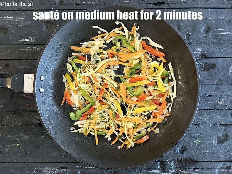 Step 14 – <p><strong>Sauté</strong> on a medium flame for another 2 minutes.</p>