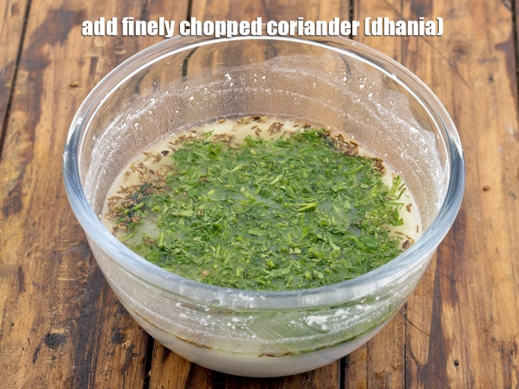 Step 16 – <p>Add the <span style="background-color:rgb(255,255,255);color:rgb(0,0,0);">1 1/2 tbsp finely </span><a href="https://www.tarladalal.com/glossary-coriander-dhania-kothmir-369i#ing_2365"><u>chopped coriander (dhania)</u></a>. Make sure that the …