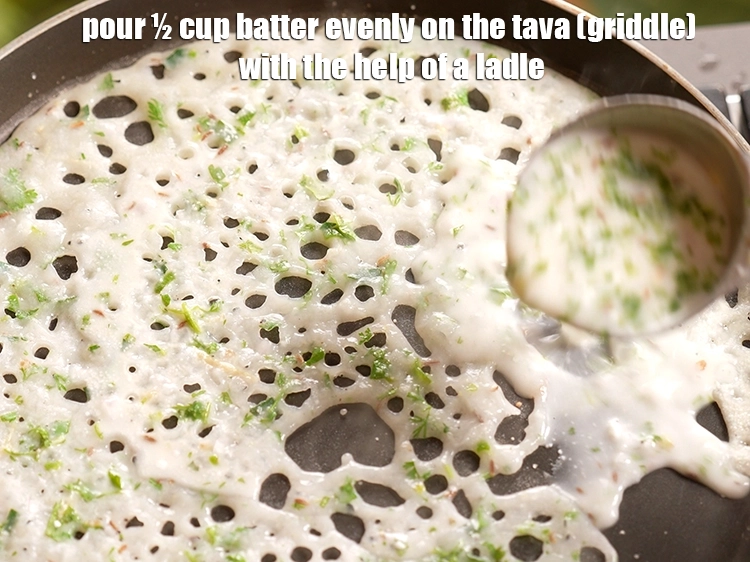 Step 20 – <p>Pour ½ cup <strong>batter</strong> evenly on the tava (griddle) with the help of a ladle. …