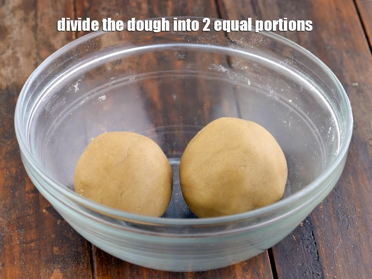 Step 11 – <p><span style="background-color:rgb(255,255,255);color:rgb(0,0,0);">To make the <strong>Sweet Shakarpara, Baked Sweet Shakar Para</strong>, divide the <strong>dough</strong> into 2 …
