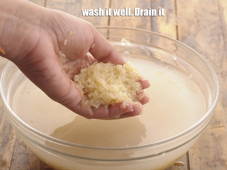 Step 2 – <p><span style="background-color:rgb(255,255,255);color:rgb(0,0,0);">Pour enough water and <strong>wash</strong> it well. <strong>Drain</strong> it.</span></p>