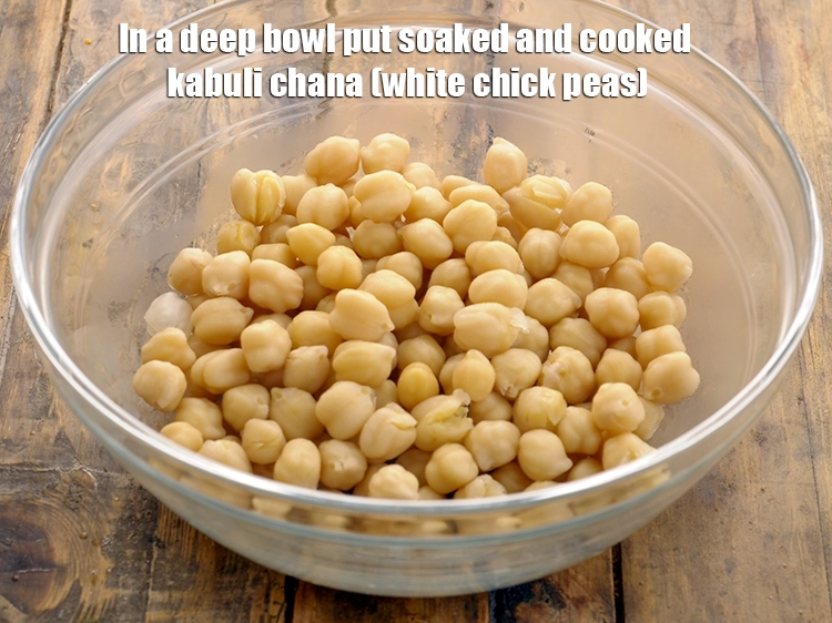 Step 10 – <p>In a deep bowl put the <span style="background-color:rgb(255,255,255);color:rgb(0,0,0);">1 1/2 cups soaked and </span><a href="https://www.tarladalal.com/glossary-kabuli-chana-chickpeas-garbanzo-chole-chana-290i#ing_2869"><u>boiled kabuli …