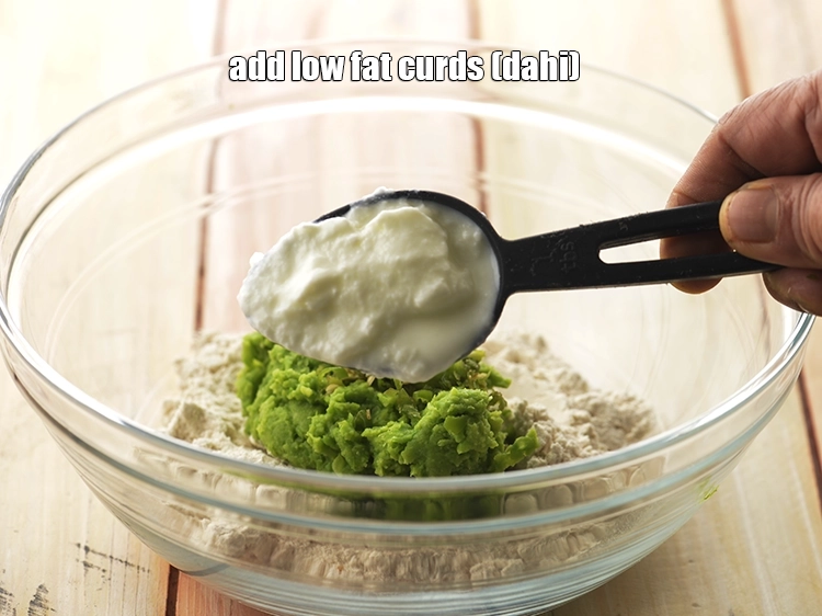 Step 14 – <p>Add <span style="background-color:rgb(255,255,255);color:rgb(0,0,0);">1 tbsp </span><a href="https://www.tarladalal.com/glossary-low-fat-curds-low-cal-dahi-low-calorie-curd-low-fat-yogurt-1107i"><u>low fat curds (dahi)</u></a>. Curd would help in making the …