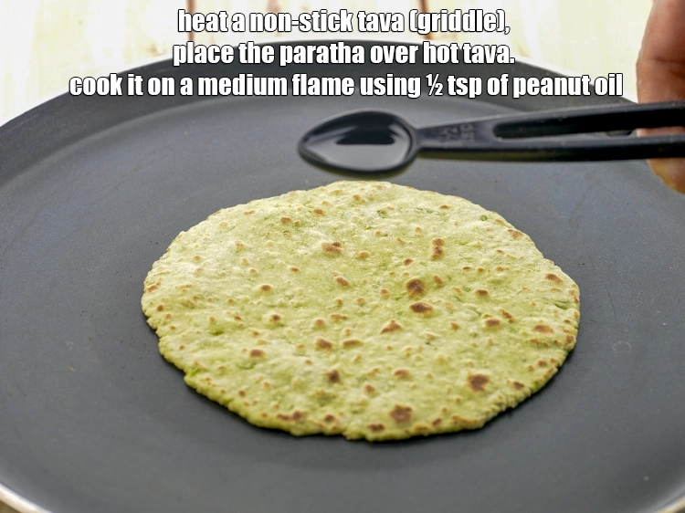 Step 22 – <p>Cook each&nbsp;<strong>Matar Paratha</strong>&nbsp;on a non-stick tava (griddle) until both sides are golden brown in colour, …