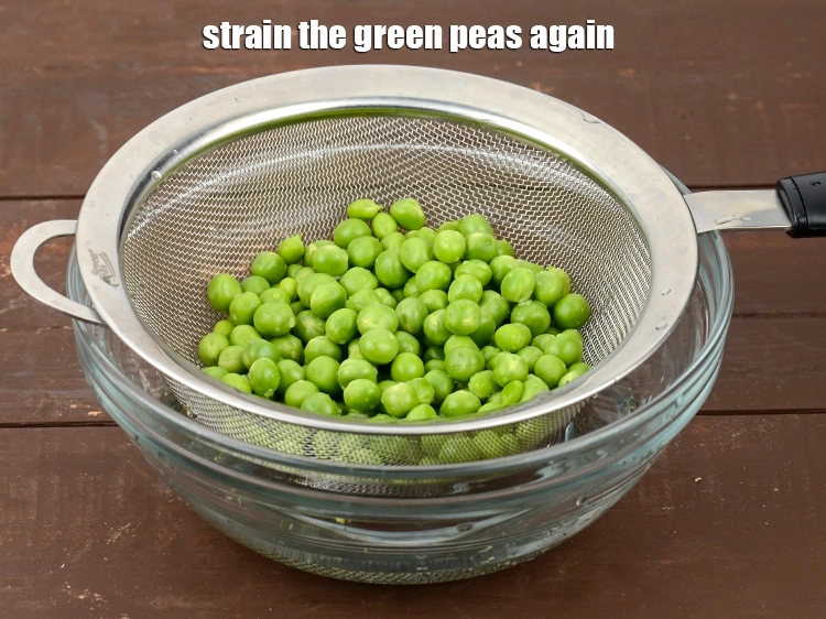 Step 8 – <p>Strain the <strong>green peas</strong> again. Discard the water or use it to make a soup.</p>