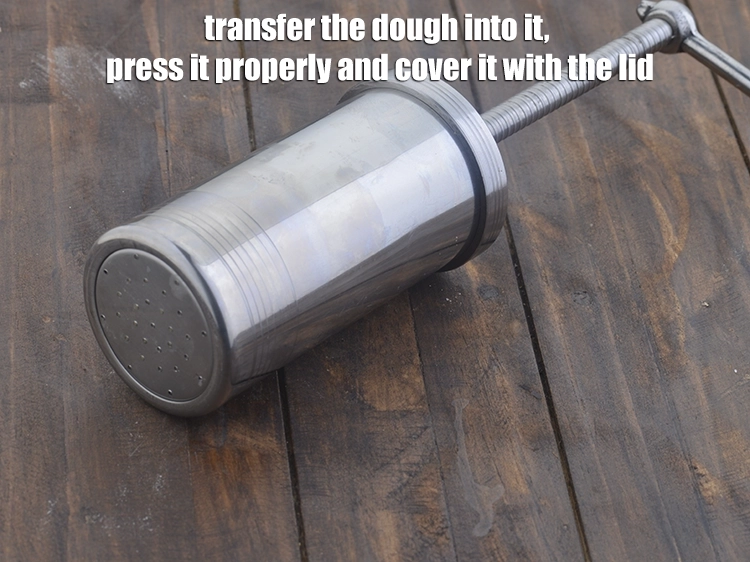 Step 3 – <p><span style="background-color:rgb(255,255,255);color:rgb(0,0,0);">Transfer the <strong>dough</strong> into it, press it properly and cover it with the lid.</span></p>