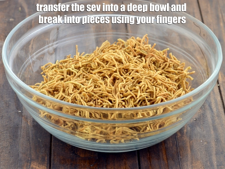 Step 6 – <p><span style="background-color:rgb(255,255,255);color:rgb(0,0,0);">Transfer the <strong>sev</strong> into a deep bowl and break into pieces using your fingers.</span></p>