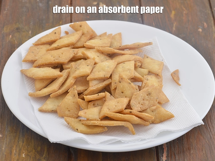 Step 10 – <p><span style="background-color:rgb(255,255,255);color:rgb(0,0,0);">Drain on an absorbent paper. Repeat steps 5 to 7 to make more <strong>namak …