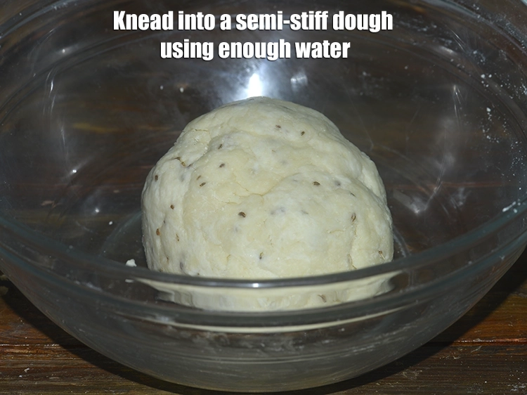 Step 3 – <p>Knead into a <strong>semi-stiff dough</strong> using enough <strong>water</strong>.</p>