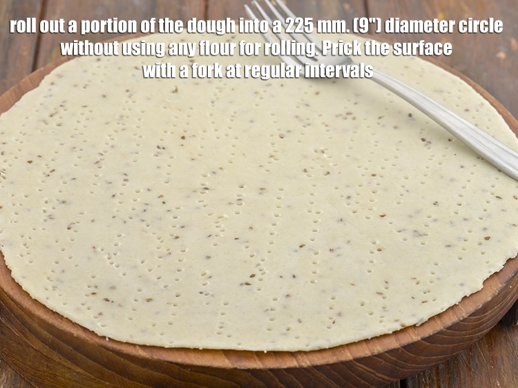 Step 6 – <p><span style="background-color:rgb(255,255,255);color:rgb(0,0,0);">Roll out a portion of the dough into a 225 mm. (9") diameter circle …