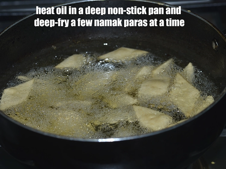 Step 8 – <p><span style="background-color:rgb(255,255,255);color:rgb(0,0,0);">Heat the </span><a href="https://www.tarladalal.com/glossary-oil-671i"><u>oil</u></a><span style="background-color:rgb(255,255,255);color:rgb(0,0,0);"> in a deep non-stick pan and deep-fry a few …