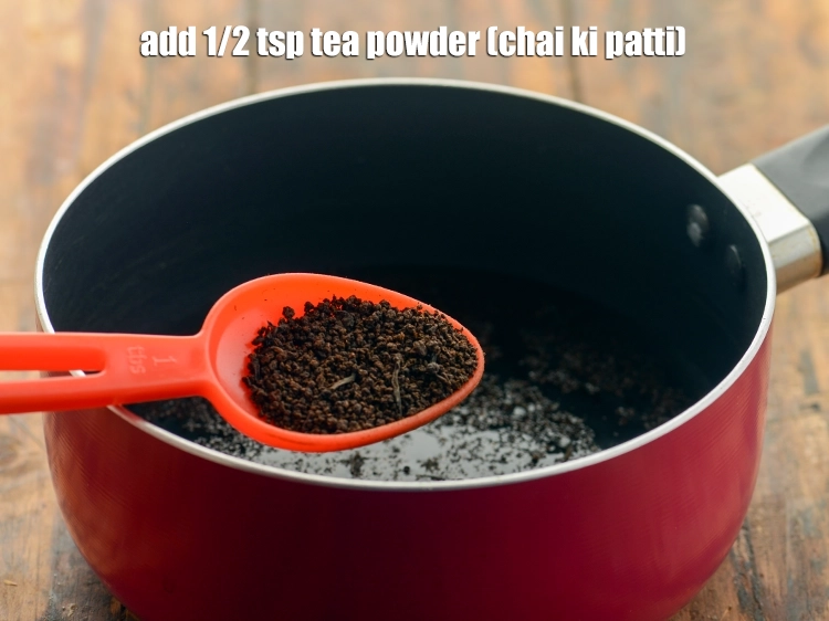 Step 2 – <p>Add the <span style="background-color:rgb(255,255,255);color:rgb(0,0,0);">1/2 tsp </span><a href="https://www.tarladalal.com/glossary-tea-powder-2185i"><u>tea powder (chai ki patti)</u></a><u>.</u></p>