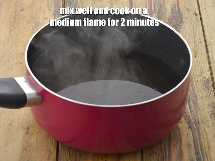 Step 3 – <p><span style="background-color:rgb(255,255,255);color:rgb(0,0,0);">Mix well and cook on a medium flame for 2 minutes, while stirring occasionally.</span></p>